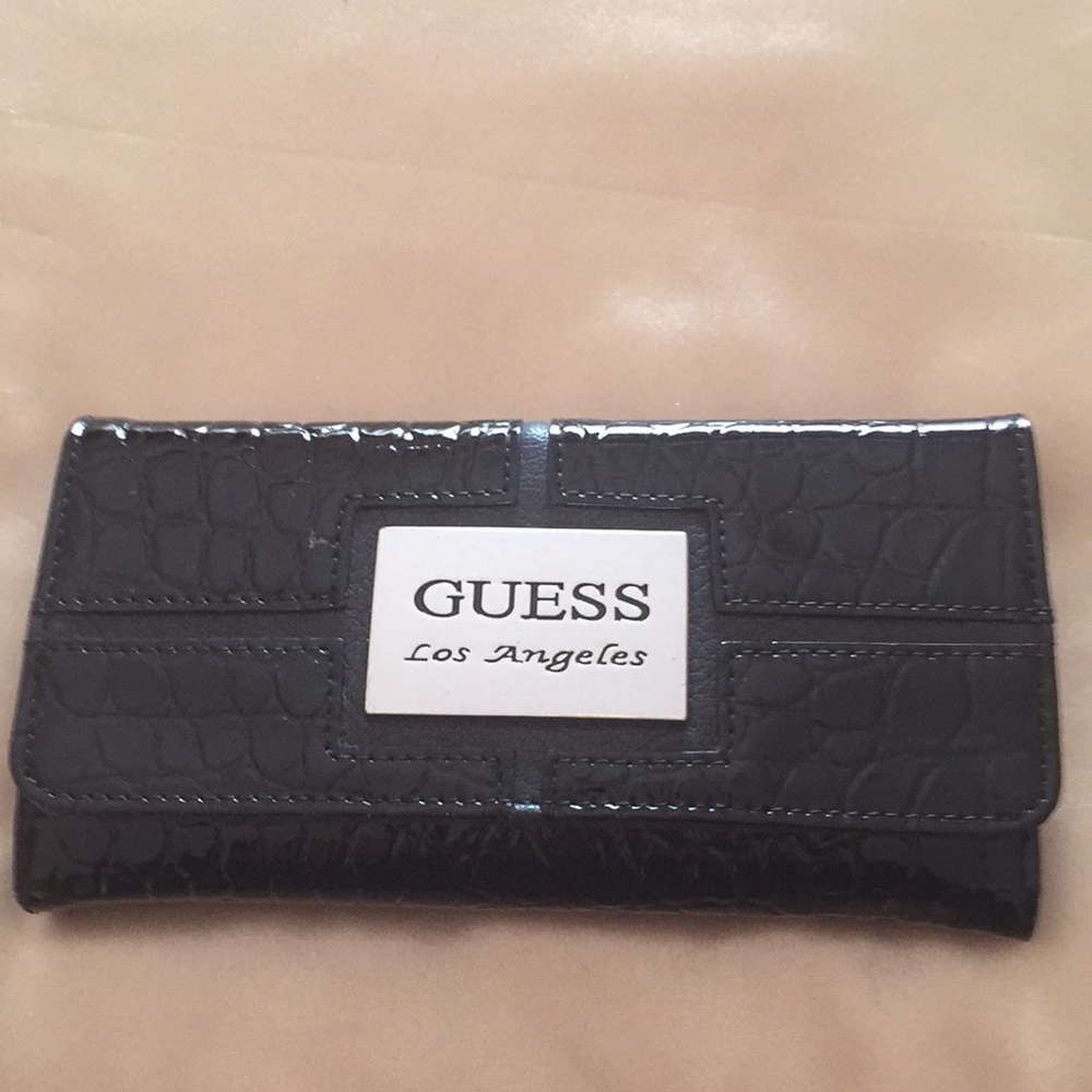 Guess black trifold ladies wallet